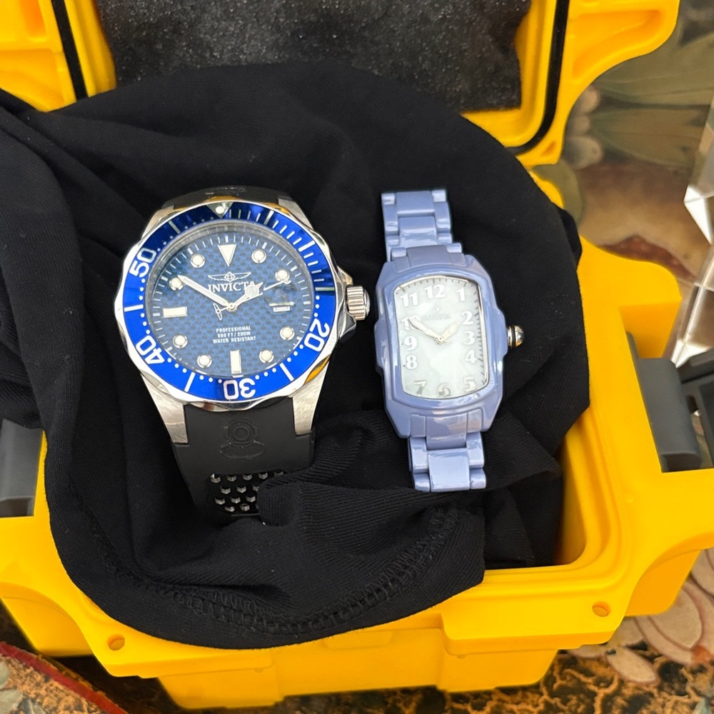 Pair men’s and ladies Invicta Watches